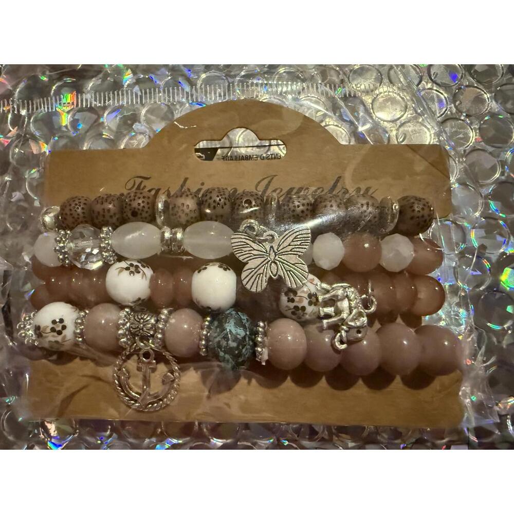 Set of 4 Fashion Bracelets with Charms New